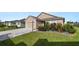 House exterior with a well-maintained lawn and landscaping at 6094 Eagle Pointe Dr, Lakeland, FL 33812