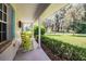 Relaxing front porch overlooking the yard at 310 Willow Oak Ct, Fort Meade, FL 33841