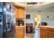 Spacious kitchen with stainless steel appliances and an island at 310 Willow Oak Ct, Fort Meade, FL 33841