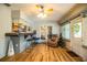 Sunroom with hardwood floors, breakfast bar, and French doors at 310 Willow Oak Ct, Fort Meade, FL 33841