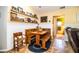 Cozy breakfast nook with built-in bench seating and a wooden table at 310 Willow Oak Ct, Fort Meade, FL 33841