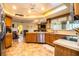 Open kitchen featuring stainless steel appliances and an island at 310 Willow Oak Ct, Fort Meade, FL 33841