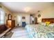 Spacious main bedroom with a king bed and ensuite bathroom access at 310 Willow Oak Ct, Fort Meade, FL 33841
