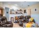 Cozy living area with built-in shelving and comfortable seating at 310 Willow Oak Ct, Fort Meade, FL 33841
