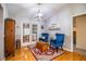 Bright sunroom with hardwood floors and French doors at 310 Willow Oak Ct, Fort Meade, FL 33841