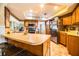 Updated kitchen with stainless steel appliances and breakfast bar at 310 Willow Oak Ct, Fort Meade, FL 33841