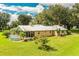 Home with screened porch, pool and large yard at 310 Willow Oak Ct, Fort Meade, FL 33841