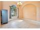 Dining room with tile floors and an arched window at 2948 Vintage View Cir, Lakeland, FL 33812