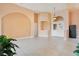 Large living room with tile flooring and lots of natural light at 2948 Vintage View Cir, Lakeland, FL 33812