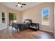 Bright bedroom with wood floors and backyard view at 2948 Vintage View Cir, Lakeland, FL 33812