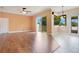 Spacious living room featuring hardwood floors and access to backyard at 2948 Vintage View Cir, Lakeland, FL 33812