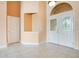 Bright and spacious entryway with double doors and tile flooring at 2948 Vintage View Cir, Lakeland, FL 33812