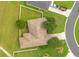 Overhead view of a single Gathering home, highlighting the roofline and surrounding yard at 2948 Vintage View Cir, Lakeland, FL 33812
