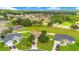 Aerial view of a house and surrounding neighborhood, showcasing the property's location and landscape at 2948 Vintage View Cir, Lakeland, FL 33812