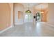 Open living room with high ceilings and tile flooring at 2948 Vintage View Cir, Lakeland, FL 33812