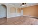 Large living room with hardwood floors and arched niches at 2948 Vintage View Cir, Lakeland, FL 33812