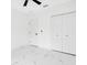Bedroom with double door closet and ceiling fan at 1896 12Th St, Orange City, FL 32763