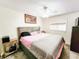 Spacious main bedroom with king-size bed and ample closet space at 2036 E Gachet Blvd, Lakeland, FL 33813