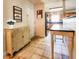 Bright entryway with tiled floors and built-in storage at 2036 E Gachet Blvd, Lakeland, FL 33813