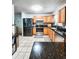 Modern kitchen with stainless steel appliances and granite countertops at 2036 E Gachet Blvd, Lakeland, FL 33813