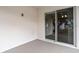 Covered patio accessible via sliding glass doors at 568 Sw 77Th Cir, Ocala, FL 34480
