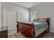 Bright bedroom with carpeted floors and double door closet at 8218 Wilder Loop, Lakeland, FL 33809