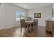 Dining room with six chairs and a wood table at 8218 Wilder Loop, Lakeland, FL 33809