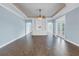 Bright living room with hardwood floors and a ceiling fan at 6414 Highlands In The Woods St, Lakeland, FL 33813