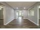 Bright living room with hardwood floors and an open floor plan at 415 Lucille St, Bartow, FL 33830