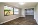Living room with hardwood floors and large windows at 415 Lucille St, Bartow, FL 33830