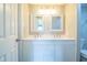 Bathroom with double vanity and updated fixtures at 415 Lucille St, Bartow, FL 33830