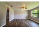 Spacious bedroom with hardwood floors and ceiling fan at 415 Lucille St, Bartow, FL 33830
