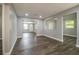 Bright living room with hardwood floors and an open floor plan at 415 Lucille St, Bartow, FL 33830