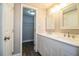 Bathroom with double vanity and closet at 415 Lucille St, Bartow, FL 33830