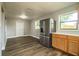 Dining area with hardwood floors and access to kitchen at 415 Lucille St, Bartow, FL 33830