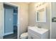 Bathroom with vanity and view into bedroom at 415 Lucille St, Bartow, FL 33830