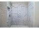Large walk-in shower with marble tile at 415 Lucille St, Bartow, FL 33830
