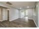 Bright living room with hardwood floors and an open floor plan at 415 Lucille St, Bartow, FL 33830