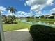 Enjoy the water view from your backyard patio at 1045 Caravan Loop, Polk City, FL 33868