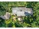 House with a large backyard and mature trees at 7525 Catherine Dr, Lakeland, FL 33810