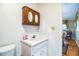 Bathroom features a vanity with a medicine cabinet at 7525 Catherine Dr, Lakeland, FL 33810