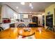 Eat-in kitchen with white cabinets, island, and hardwood floors at 7525 Catherine Dr, Lakeland, FL 33810
