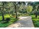 Beautiful home nestled on a spacious lot with lush landscaping at 7525 Catherine Dr, Lakeland, FL 33810