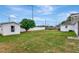 Large backyard with shed and lush green grass at 4618 Crestview Ln, Lakeland, FL 33813