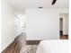 Light and airy bedroom with hardwood floors and a walk-in closet at 4618 Crestview Ln, Lakeland, FL 33813