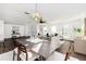 Open concept dining room with a large table and seating area at 4618 Crestview Ln, Lakeland, FL 33813