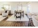 Elegant dining room with a modern table and chairs, and an area rug at 4618 Crestview Ln, Lakeland, FL 33813