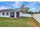 House exterior showcasing a screened porch and backyard at 4618 Crestview Ln, Lakeland, FL 33813