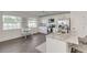 Modern kitchen with white cabinets, stainless steel appliances, and an island at 4618 Crestview Ln, Lakeland, FL 33813