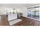 Modern kitchen with white cabinets, granite countertops and stainless steel appliances at 4618 Crestview Ln, Lakeland, FL 33813